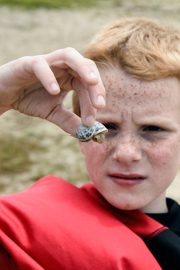 Kid holding snail photo