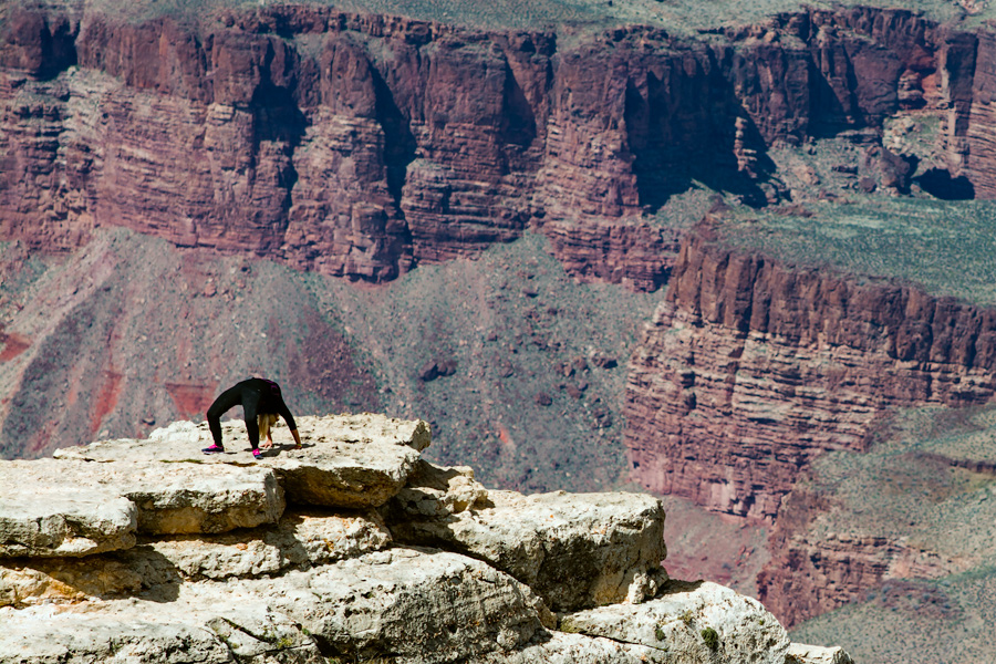Woman in spider pose upside down by Grand Canyon photo